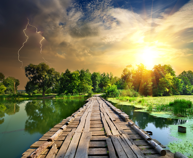 calming storm above a wooden pathway