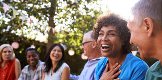 Group of people laughing.