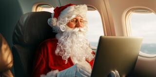 Santa Claus working on board the plane