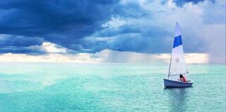 Lonely boat sport sailing on the lake