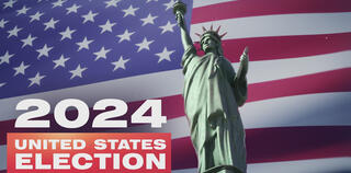 The Statue of Liberty with inscription of 2024 Presidential Election in the United States and waving American flag animation in the backgroung
