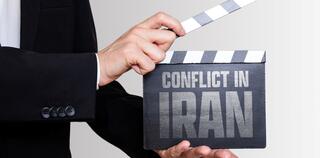 CONFLICT IN IRAN Displayed On Film Clapperboard