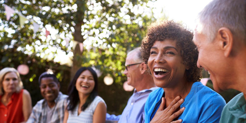 Group of people laughing.