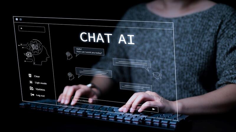 Woman using a computer chatting with an intelligent artificial intelligence asks for the answers he wants. A.I. Chat with AI or Artificial Intelligence technology.